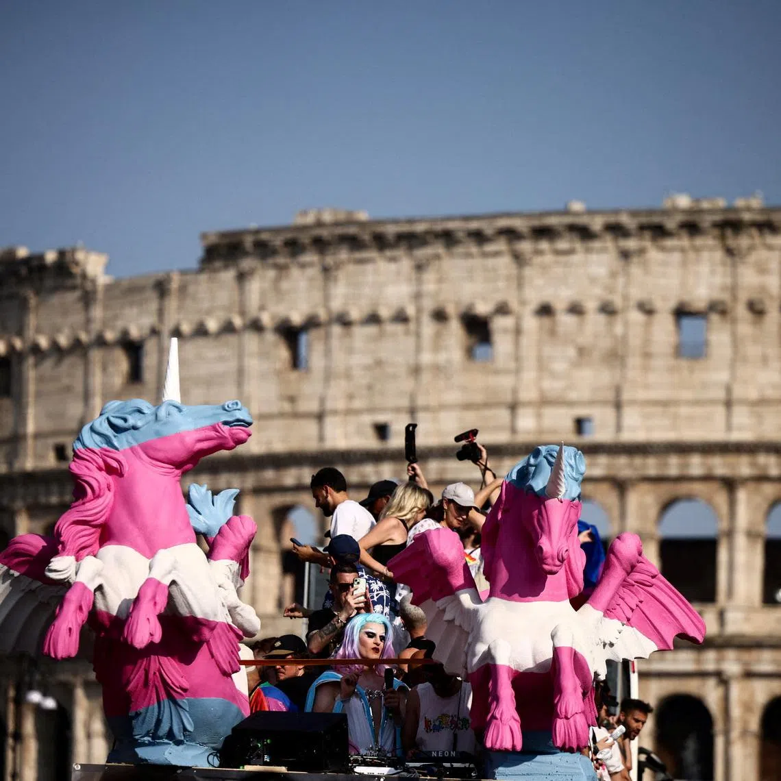 FILE PHOTO: People attend the annual LGBTQ+ Pride parade in Rome, Italy, June 14, 2025. REUTERS/Yara Nardi/File Photo