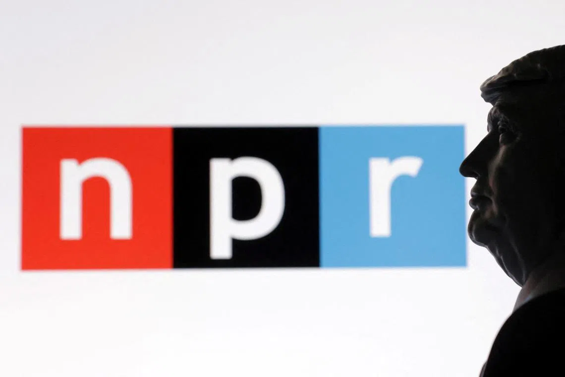 A 3D-printed miniature model of U.S. President Donald Trump with the National Public Radio (NPR) logo in the background is seen in this illustration taken April 23, 2025. REUTERS/Dado Ruvic/Illustration/File Photo