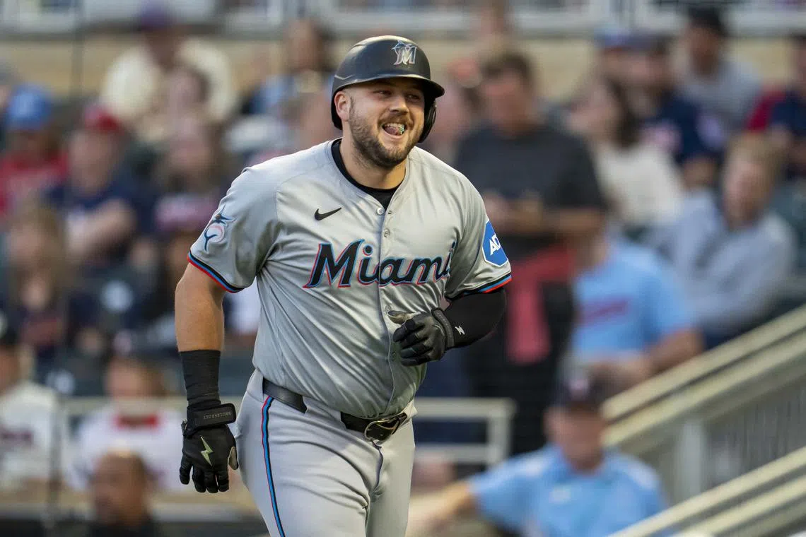Sep 25, 2024; Minneapolis, Minnesota, USA; Miami Marlins designated hitter Jake Burger (36) celebrates after hitting a three-run home run against the Minnesota Twins in the first inning at Target Field. Mandatory Credit: Jesse Johnson-Imagn Images/ File Photo