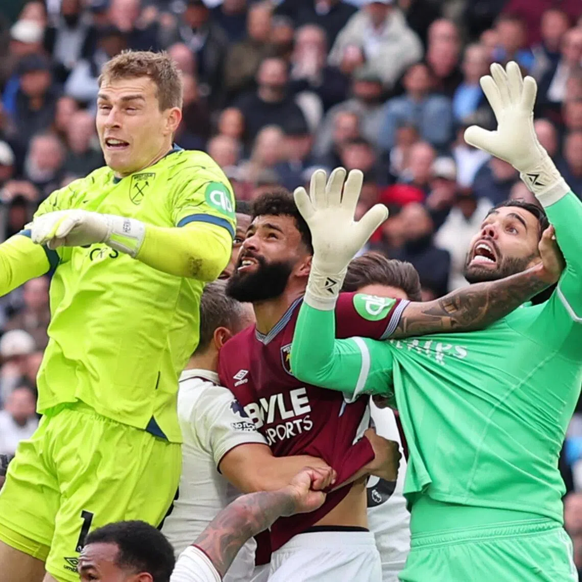 West Ham United’s Pablo obstructing Arsenal goalkeeper David Raya with his arm, behind Hammers custodian Mads Hermansen, during a corner in stoppage time of their Premier League game on May 10. Callum Wilson’s equaliser after Raya dropped the ball was disallowed following the video assistant referee’s intervention and the Gunners secured a crucial 1-0 away win.