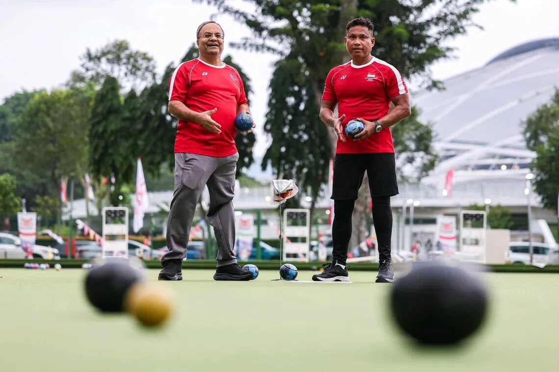 Singapore para-lawn bowlers Mawjit Singh (left) and Khirmern Mohamad at Kallang Lawn Bowls on July 8.