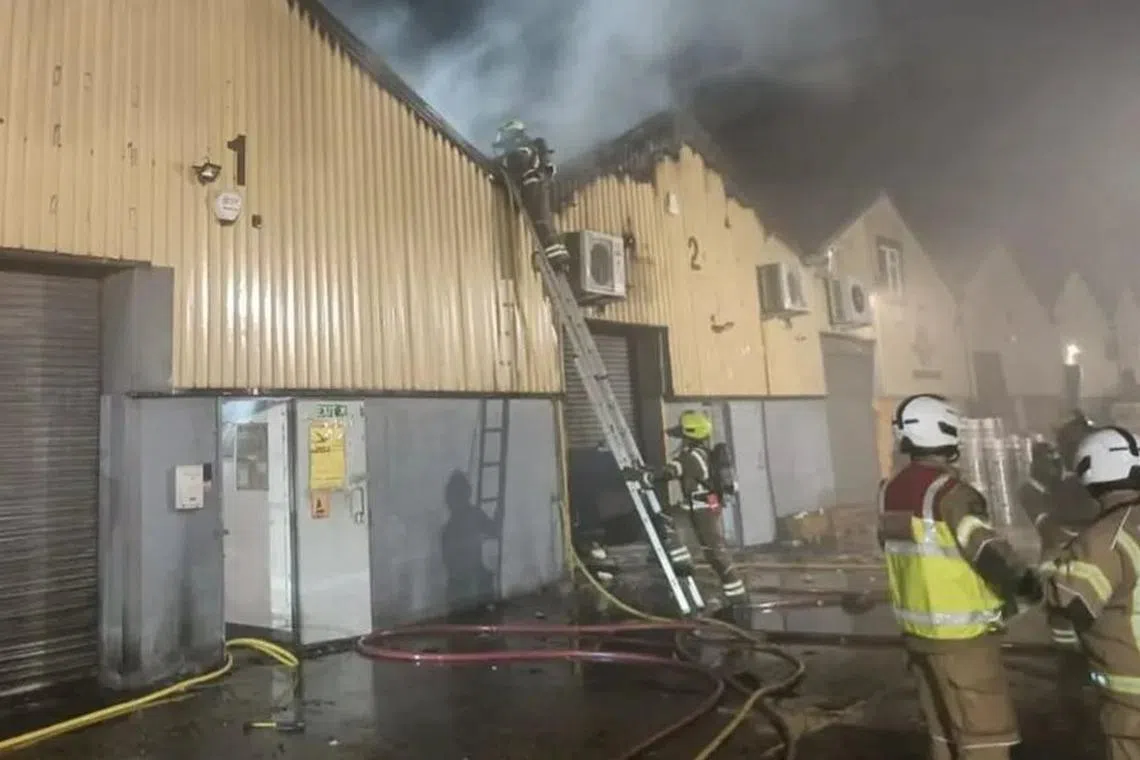 Sixty firefighters were needed to bring the blaze at a Ukrainian-linked commercial property in east London under control.