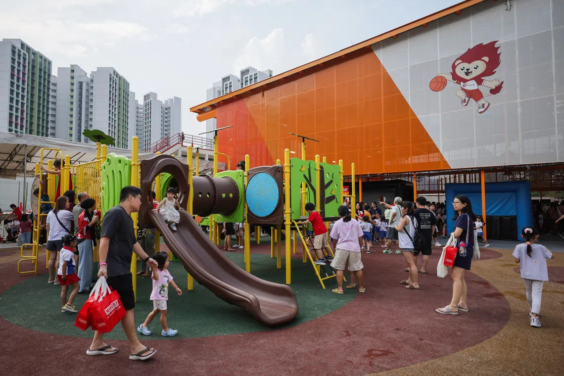 Residents use the playground at The Bricks during its official opening and the Brickland-Tengah National Day Celebration 2026 on Aug 15.
