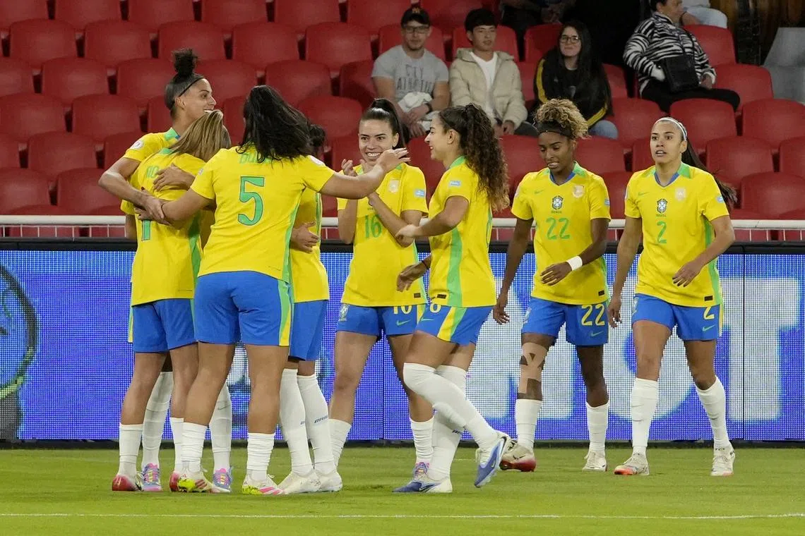 FILE PHOTO: Soccer Football - Women's Copa America - Semi Final - Brazil v Uruguay - Estadio Rodrigo Paz Delgado, Quito, Ecuador - July 29, 2025 Brazil's Giovana celebrates scoring their second goal with teammates REUTERS/Cristina Vega/File Photo
