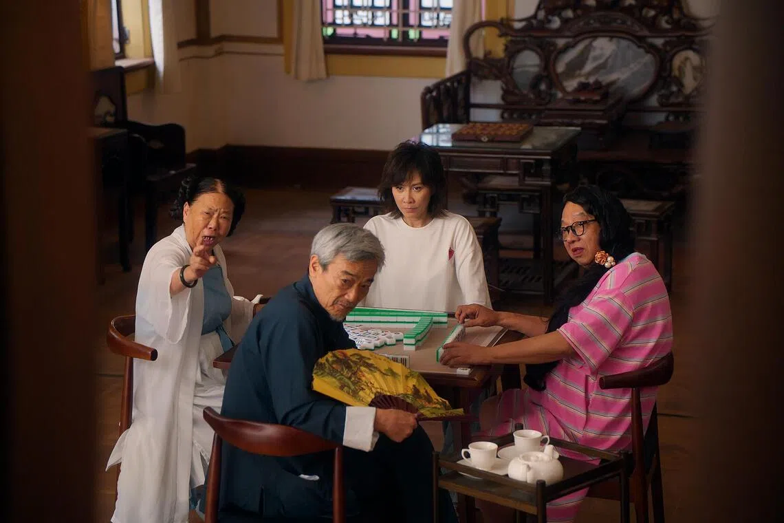Carina Lau (centre) plays an Emei martial arts grandmaster and mentor to the women’s football team in Kung Fu Soccer.