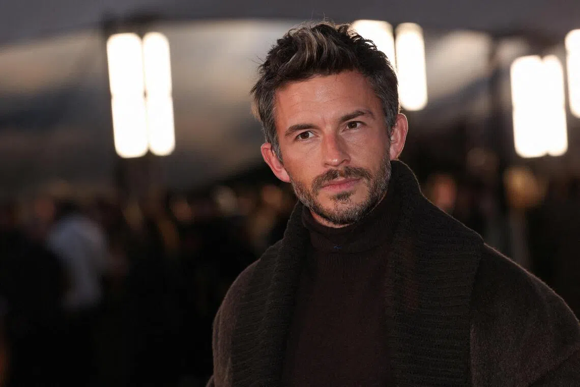 FILE PHOTO: Jonathan Bailey arrives for the Burberry SS26 catwalk show during London Fashion Week in London, Britain, September 22, 2025. REUTERS/Katie Collins/File Photo