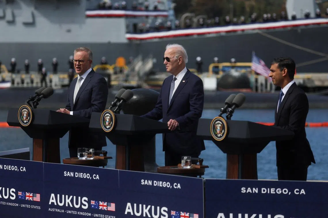 FILE PHOTO: U.S. President Joe Biden, Australian Prime Minister Anthony Albanese and British Prime Minister Rishi Sunak deliver remarks on the Australia - United Kingdom - U.S. (AUKUS) partnership, after a trilateral meeting, at Naval Base Point Loma in San Diego, California U.S. March 13, 2023. REUTERS/Leah Millis/File Photo