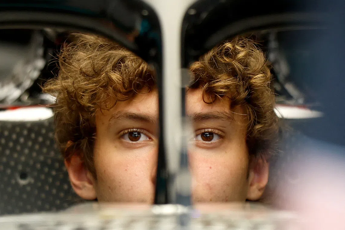 Reflection of Mercedes' Italian driver Kimi Antonelli in the cockpit of his car during the media day ahead of the Sao Paulo Formula One Grand Prix at the Jose Carlos Pace racetrack, aka Interlagos, in Sao Paulo, Brazil on Nov 6, 2025. 