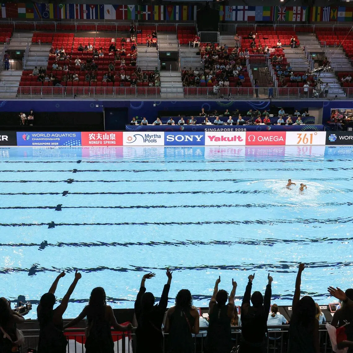Fans cheering on Eygptian artistic swimmers Zeina Amr and Maryam Samer during the World Aquatics Championships (WCH) at the WCH Arena on July 18, 2025. 