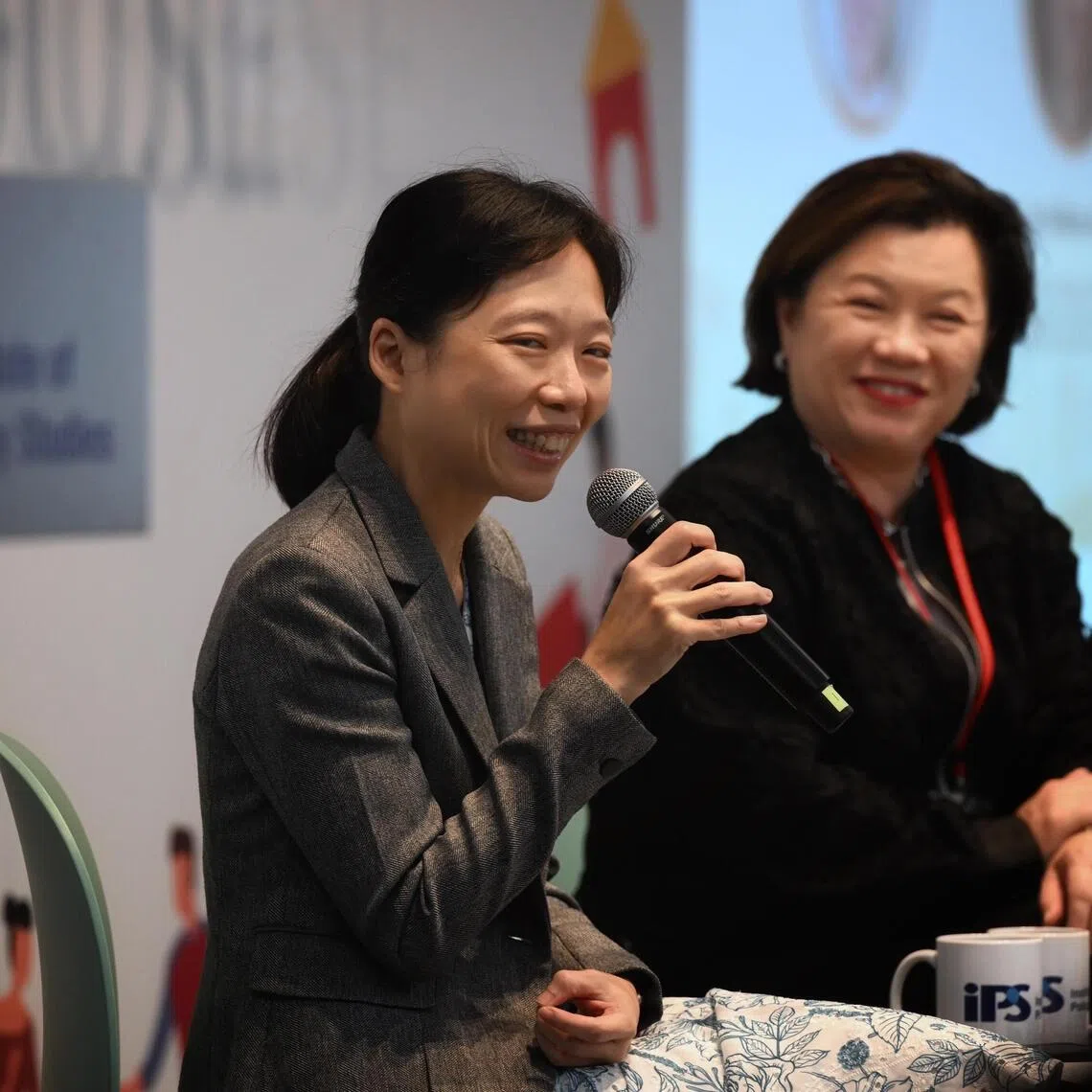 Acting Manpower Minister Jasmin Lau (left) and Institute of Policy Studies senior research fellow Gillian Koh during a dialogue session at the Young Singaporeans Conference at Temasek Shophouse on Oct 14.