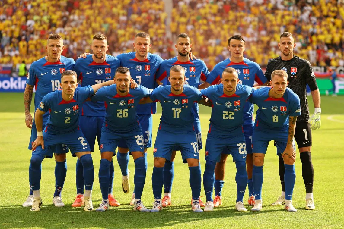 FILE PHOTO: Soccer Football - Euro 2024 - Group E - Slovakia v Romania - Frankfurt Arena, Frankfurt, Germany - June 26, 2024 Slovakia players pose for a team group photo before the match REUTERS/Kai Pfaffenbach/File Photo