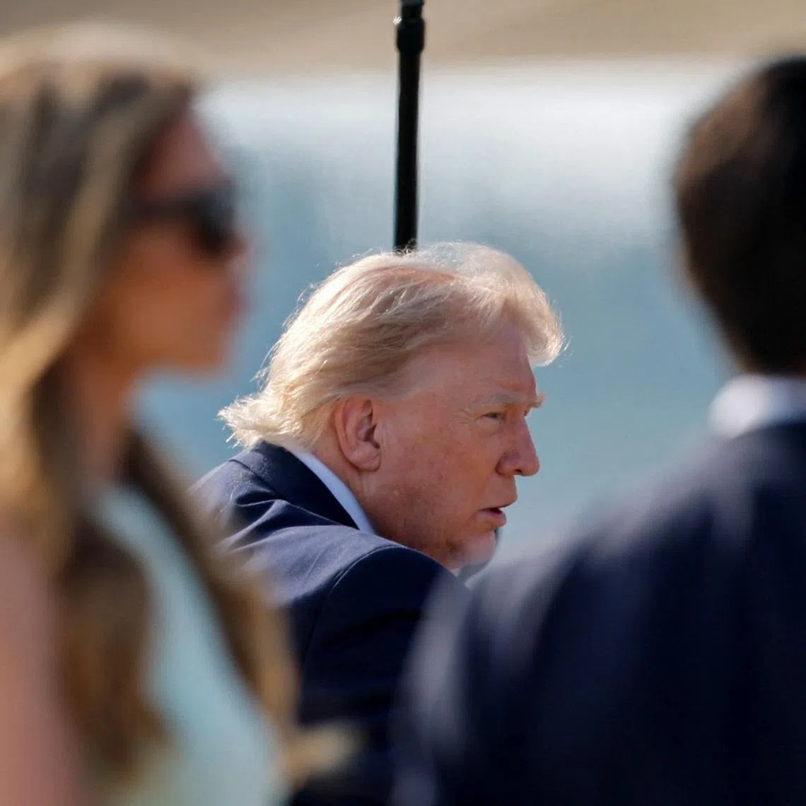 U.S. President Donald Trump speaks with reporters as he arrives to board the new Air Force One, a plane gifted by the Qatari government, after departing Joint Base Andrews, Maryland, U.S., July 1, 2026. REUTERS/Kylie Cooper