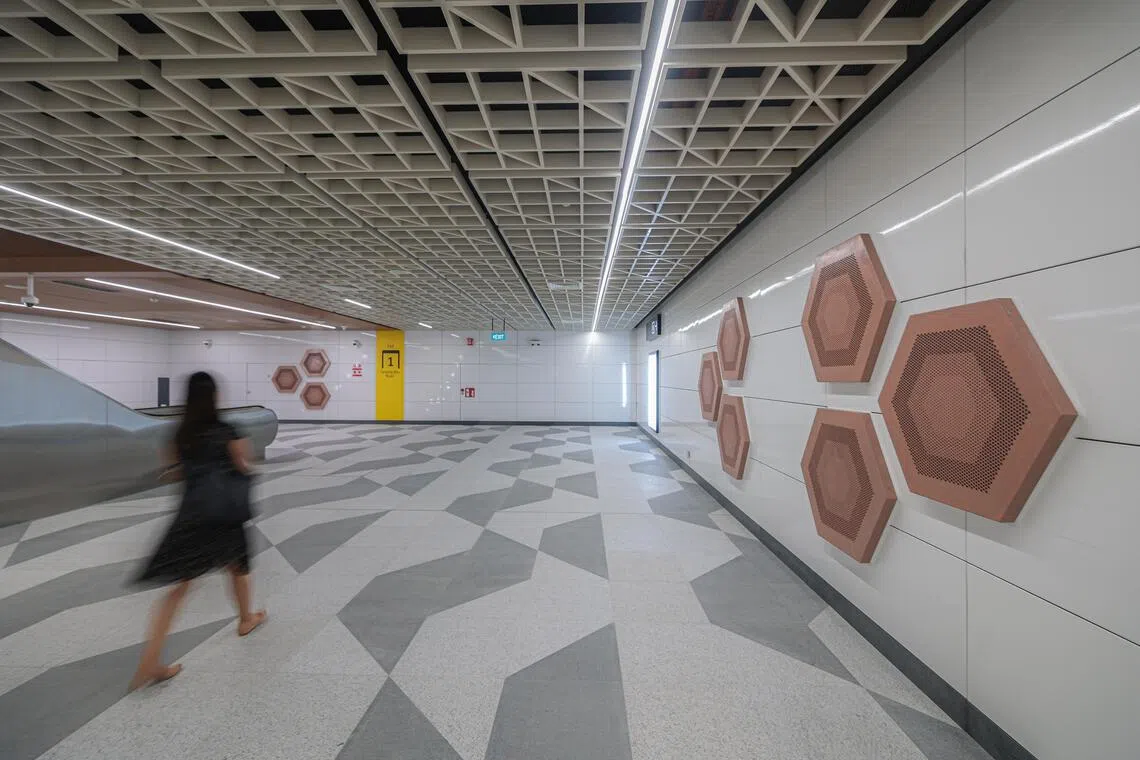 Art panels along a walkway at a Thomson East-Coast Line MRT station.
