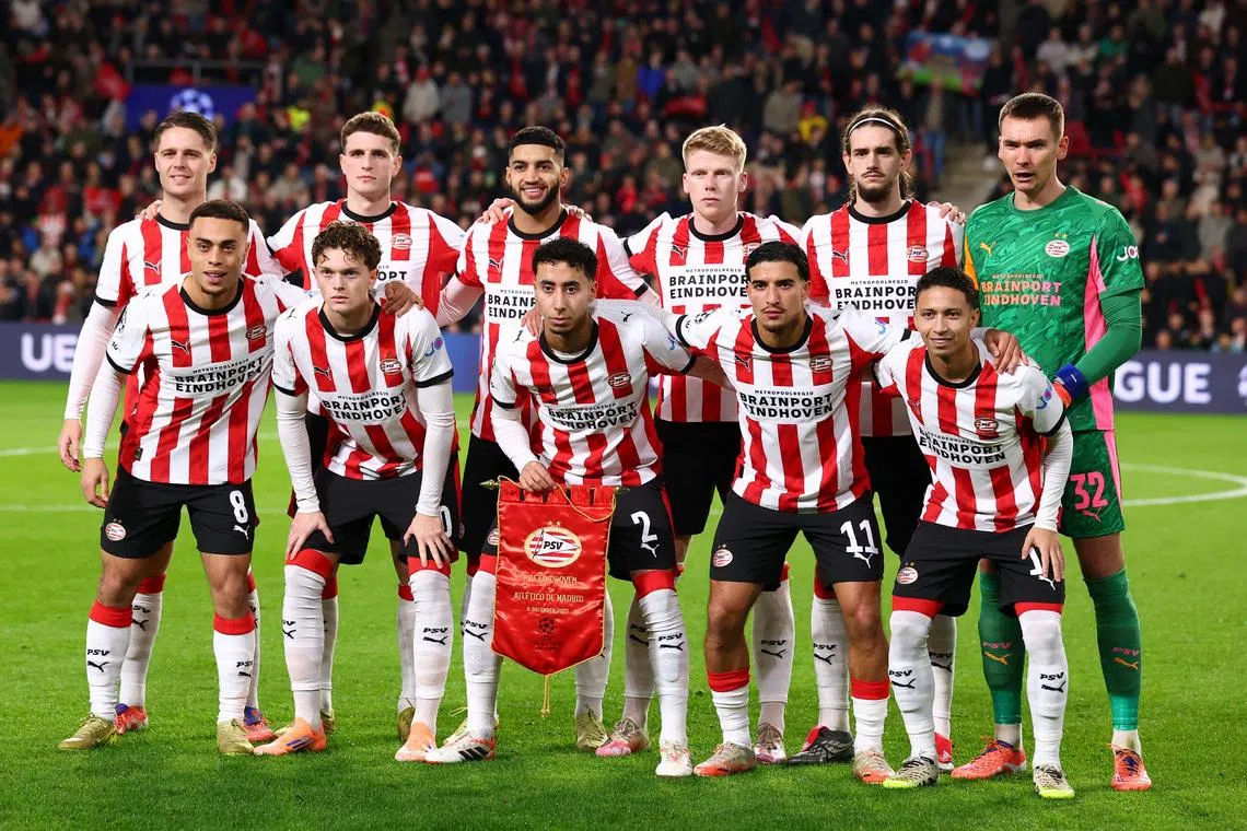 FILE PHOTO: Soccer Football - UEFA Champions League - PSV Eindhoven v Atletico Madrid - Philips Stadion, Eindhoven, Netherlands - December 9, 2025 PSV Eindhoven players pose for a team group photo before the match REUTERS/Piroschka Van De Wouw/File Photo