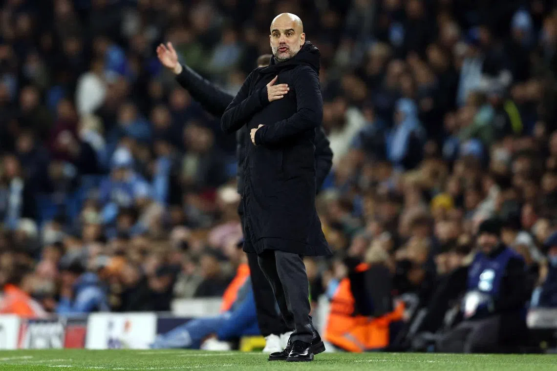 Manchester City' manager Pep Guardiola reacting during the Champions League Group B match against Young Boys at the Etihad Stadium in Manchester.