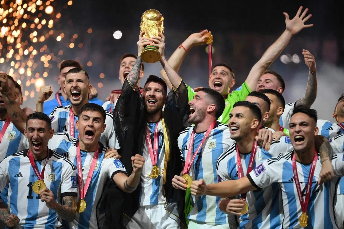 Captain Lionel Messi lifting the World Cup after Argentina beat France on penalties at Lusail Stadium in Qatar on  Dec 18, 2022.