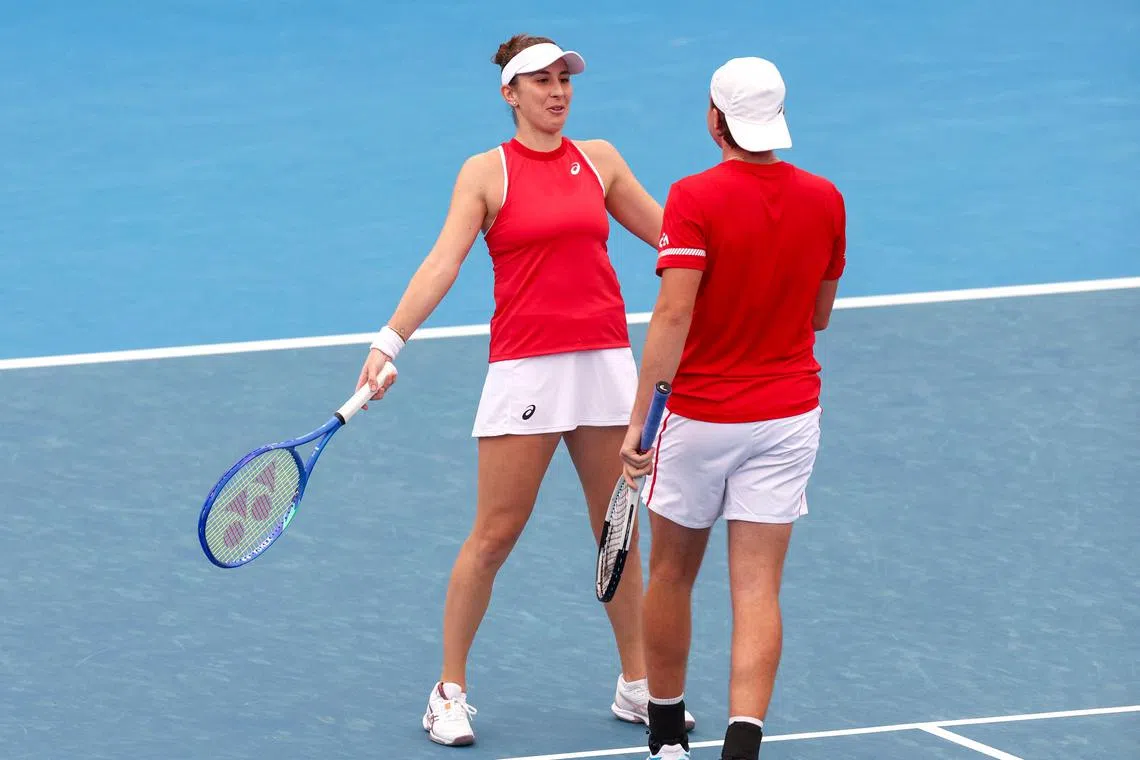 Switzerland's Belinda Bencic (left) and Dominic Stricker beat France's Edouard Roger-Vasselin and Elixane Lechemia 6-1 7-6(4).