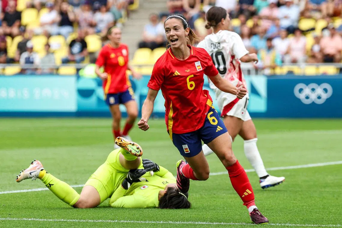 Spain midfielder Aitana Bonmati celebrating after scoring her team's first goal in the women's group C football match between Spain and Japan during the Paris 2024 Olympic Games at La Beaujoire Stadium in Nantes on July 25.