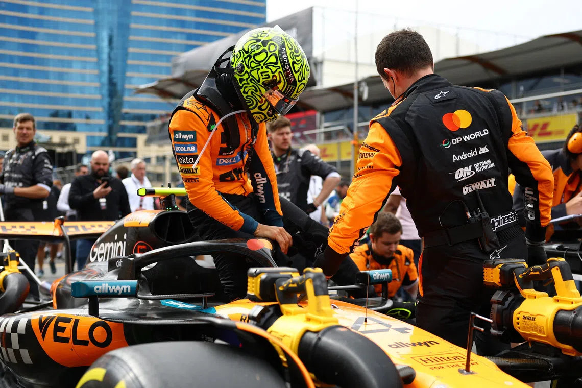 Formula One F1 - Azerbaijan Grand Prix - Baku City Circuit, Baku, Azerbaijan - September 21, 2025 McLaren's Lando Norris on the grid before the race REUTERS/Lisi Niesner