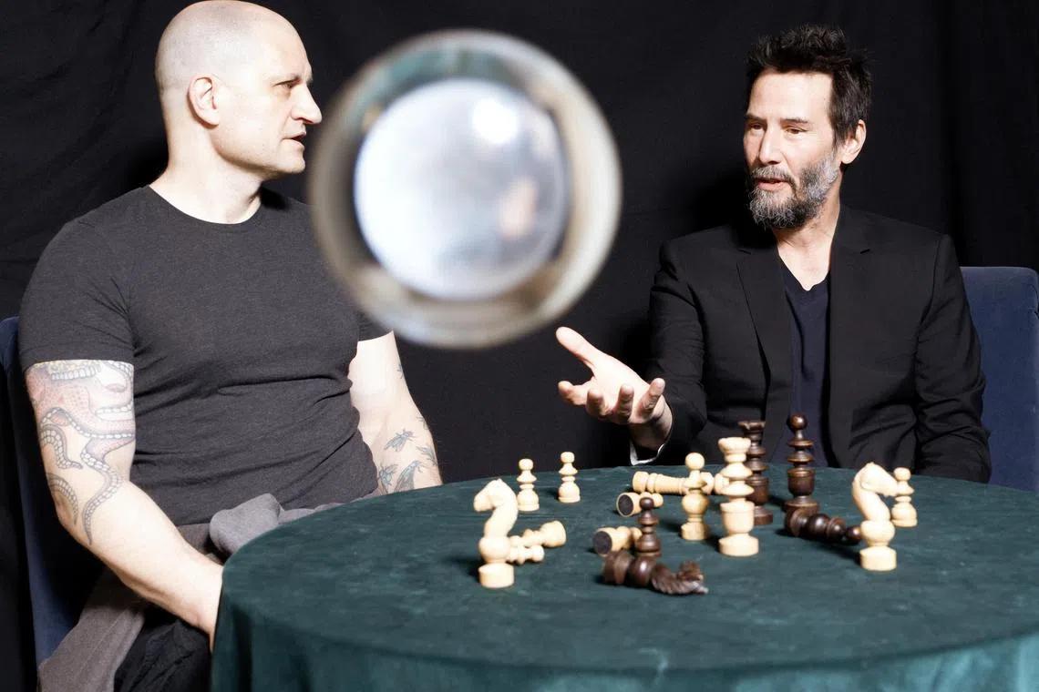 From left, the British science fiction author China MiŽville and the actor Keanu Reeves in London on June 19, 2024. What if the star of ÒThe MatrixÓ worked with a sci-fi novelist to tell the story of an 80,000-year-old warrior who can rip peopleÕs arms off but struggles with loneliness? (Guy Bolongaro/The New York Times)