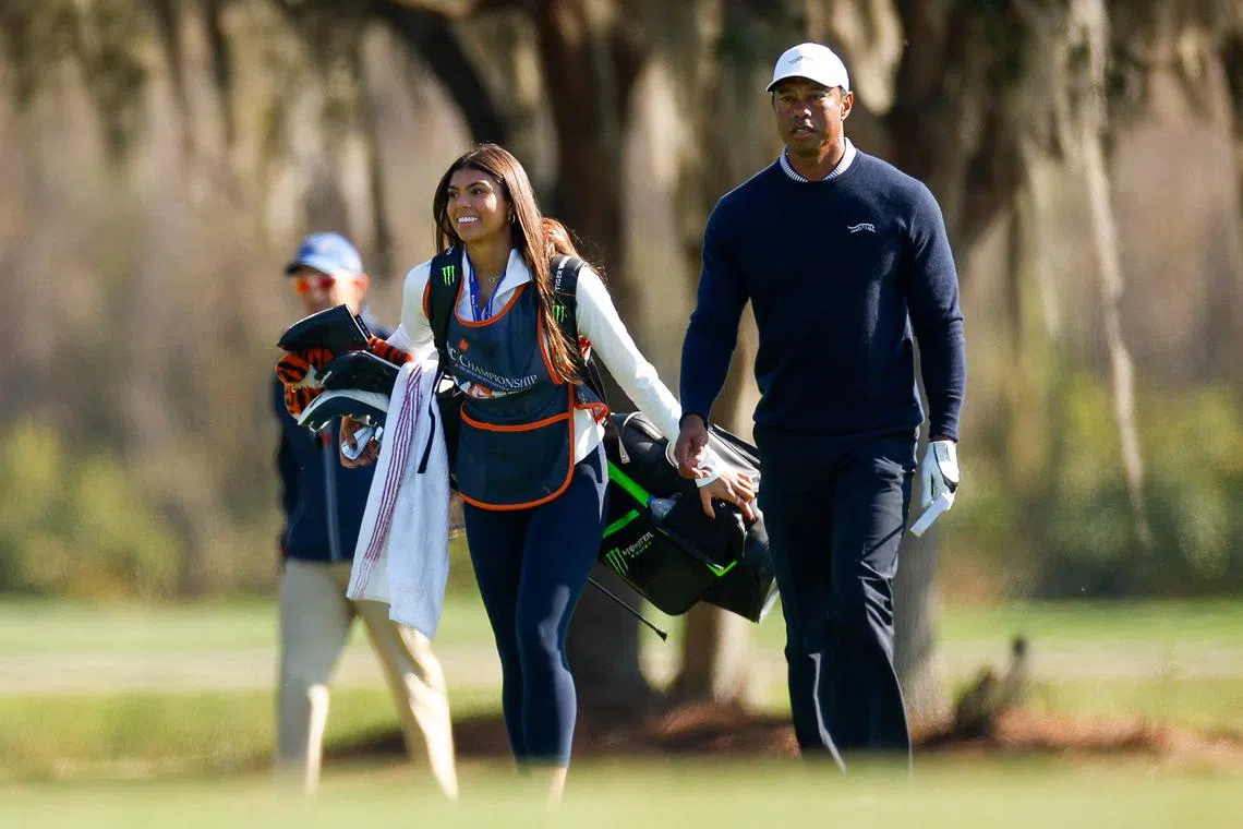 Tiger Woods and son Charlie share halfway lead in family event | The