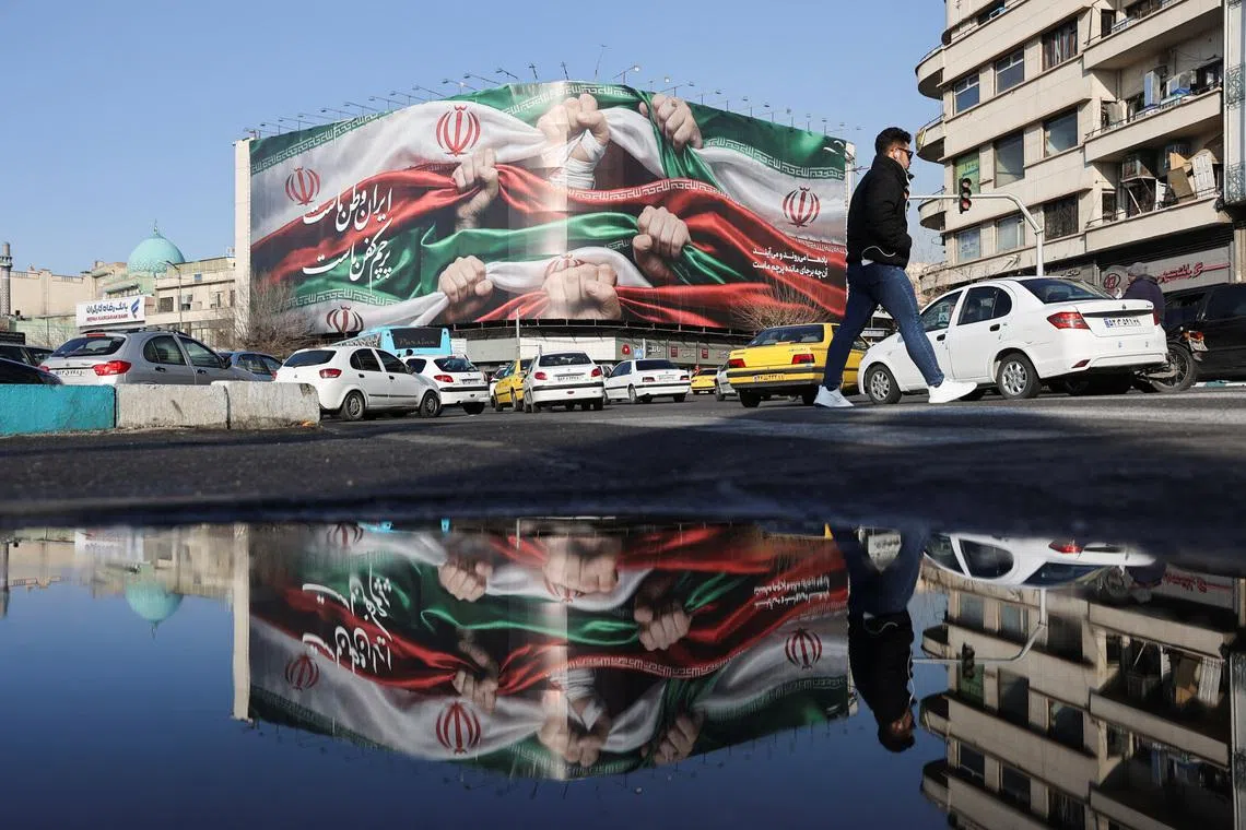 A billboard with a picture of Iran's flag, on a building in Tehran, Iran, January 24, 2026. Majid Asgaripour/WANA (West Asia News Agency) via REUTERS