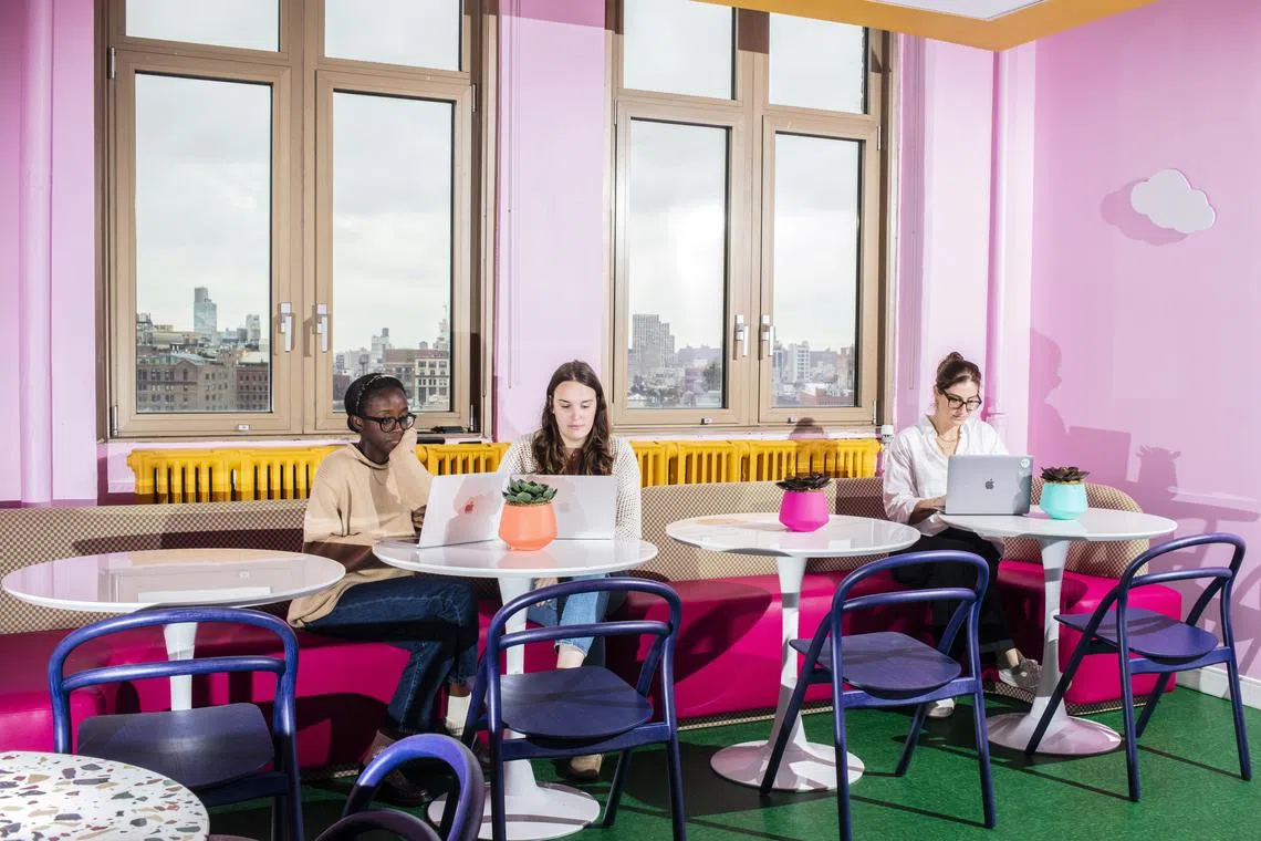 Workers in the dining room at the offices of cereal brand Magic Spoon in the SoHo neighbourhood of New York.
