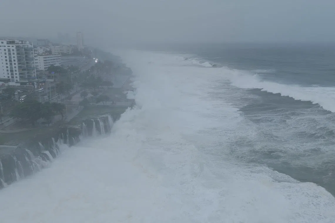 A drone view shows waves crashing on the Santo Domingo Boardwalk, in Santo Domingo, Dominican Republic July 2, 2024, in this screengrab obtained from a social media video. Instagram/@moises.arias06/via REUTERS