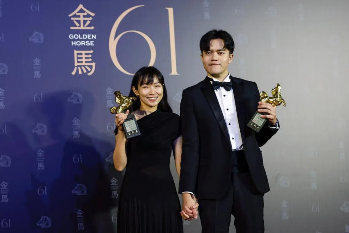 Singaporean filmmaker Chiang Wei Liang (right) and his wife Yin You-qiao, who were co-directors on their first feature film Mongrel, won Best New Director at the Golden Horse Awards held in Taiwan on Nov 23.