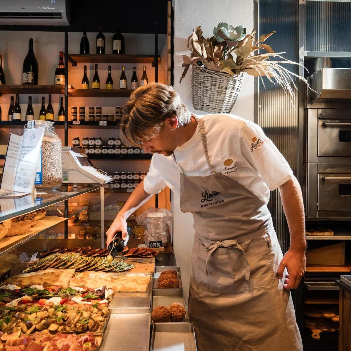 Baker-pizzaiolo Francesco Arnesano at Lievito in Rome in July 11. The traditional Roman snack sold by weight has been given an upgrade, with toppings like wine-braised meatballs.