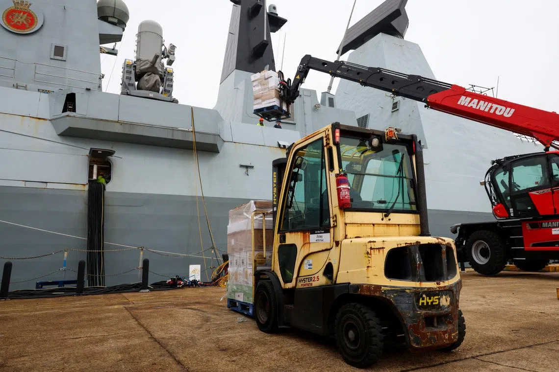 Supplies are loaded on HMS Dragon as it prepares to deploy to the Mediterranean, in Portsmouth, Britain, March 8, 2026. PO Phot Chris Sellars/UK MOD/Handout via REUTERS