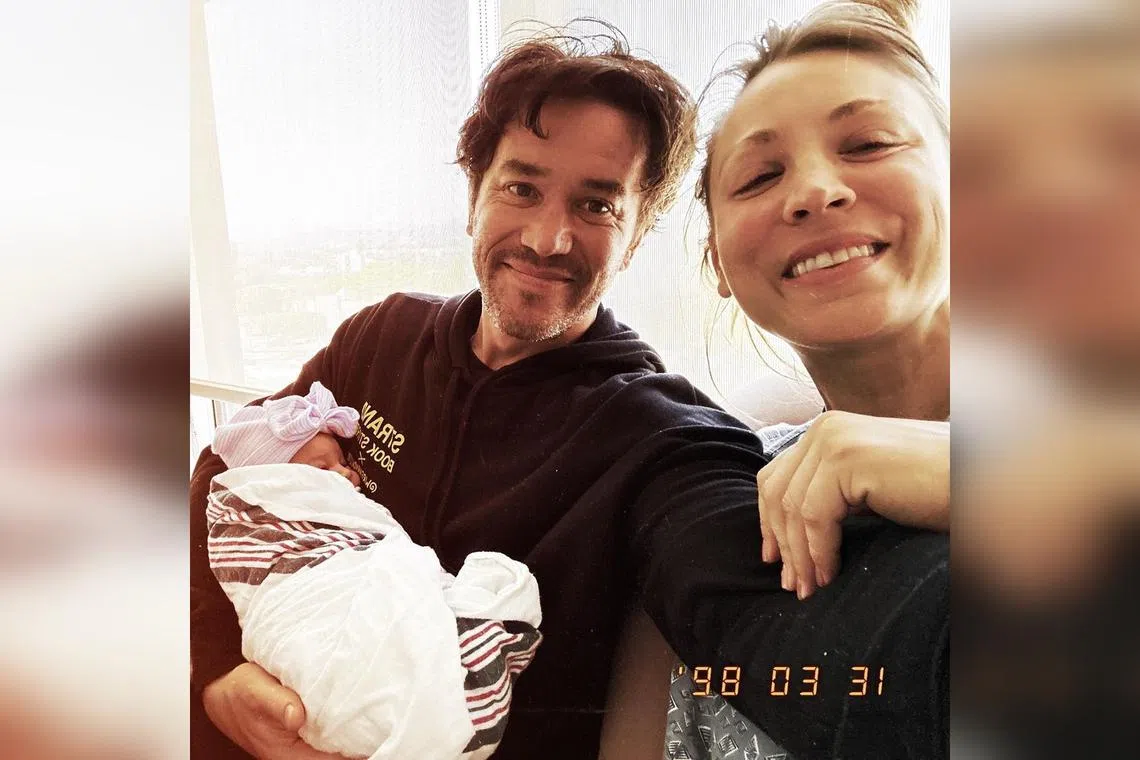 American actress Kaley Cuoco (right) with her partner, actor Tom Pelphrey, and newborn daughter Matilda.