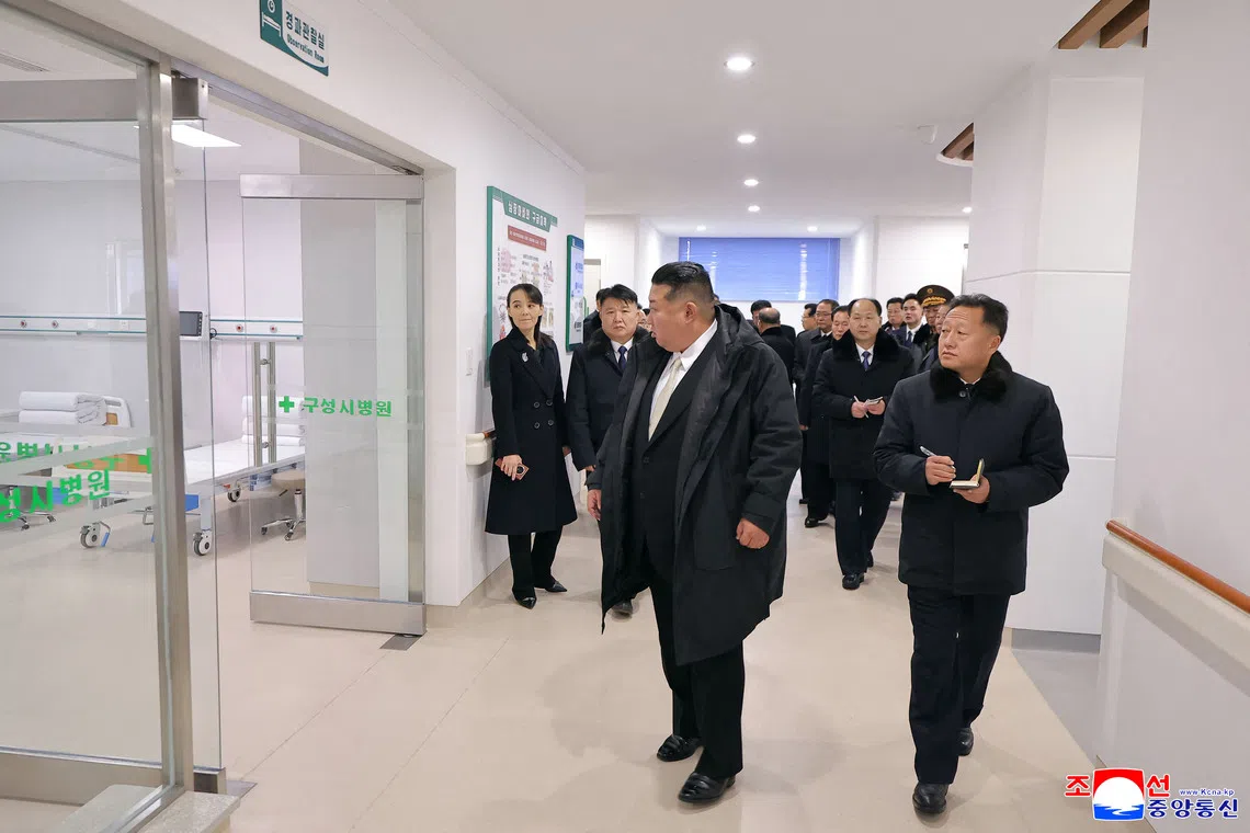 Images released by state media on Dec 14 showed Kim Yo Jong holding the phone in her right hand during a trip to a hospital opening alongside her brother Kim Jong Un.