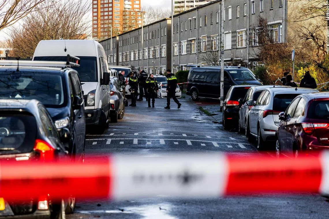 Police investigate the spot where a man was shot in the IJsselmonde neighborhood in Rotterdam, Netherlands, on Jan 2.