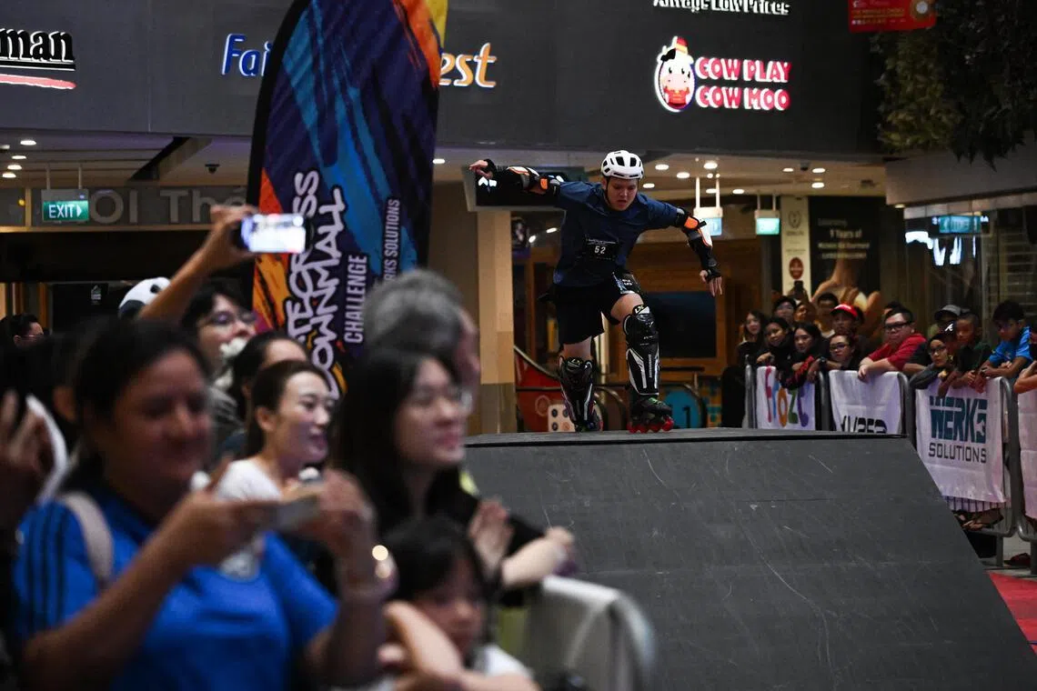 Skaters race through Seletar Mall in overnight skatecross showdown