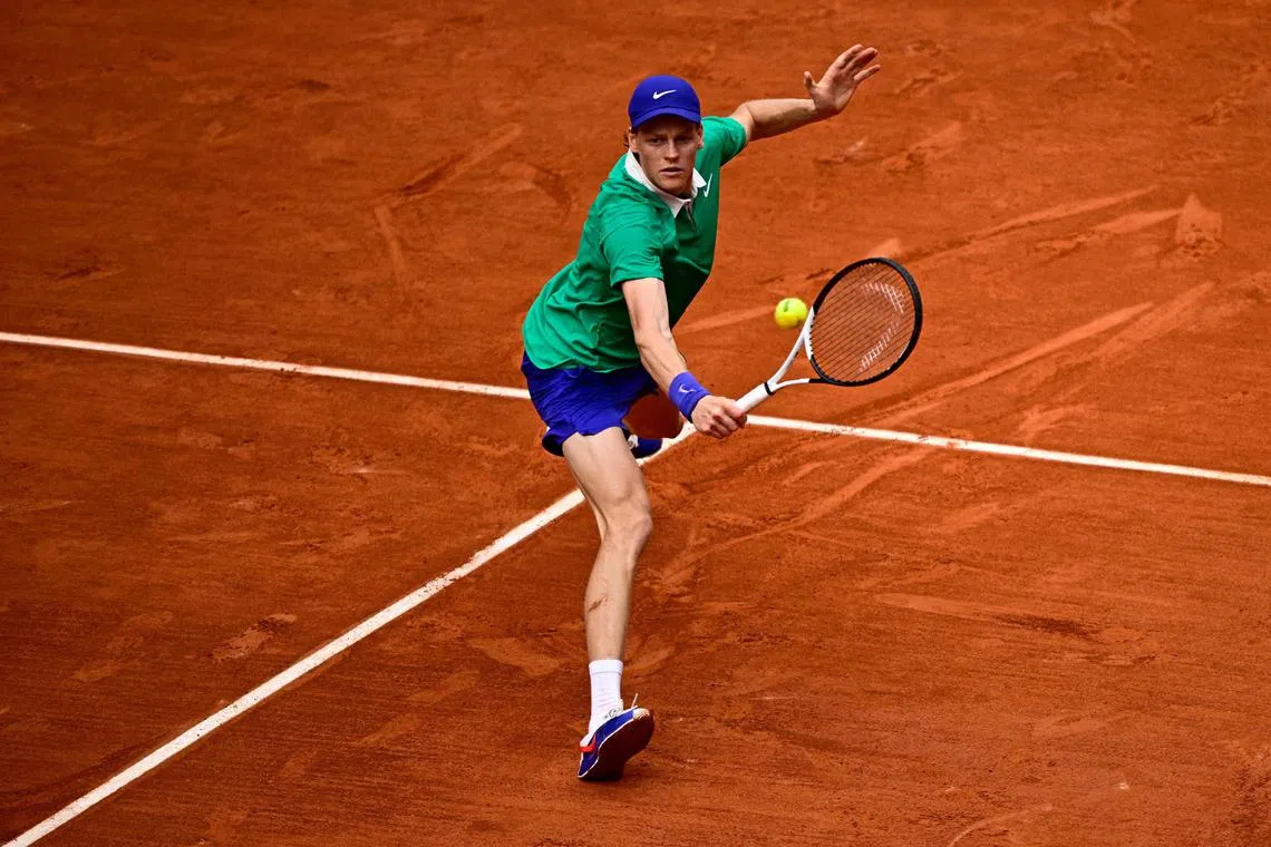 Italy's Jannik Sinner plays a backhand return to Czech Republic's Jiri Lehecka during their French Open clash.