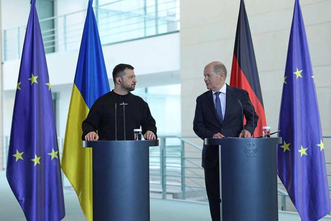 Ukraine President Volodymyr Zelensky and Germany Chancellor Olaf Scholz speaking at a news conference at the Chancellery in Berlin, Germany, on May 14, 2023. 