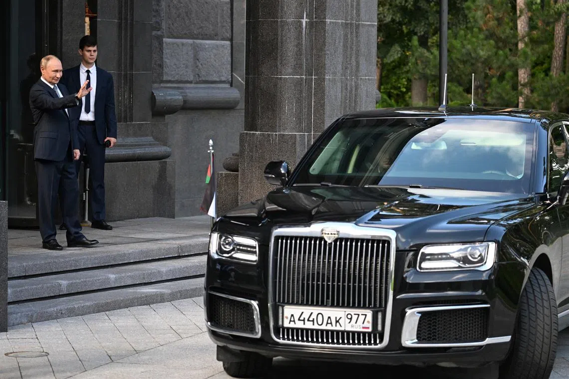 Russian President Vladimir Putin bids farewell to Palestinian President Mahmoud Abbas following their meeting outside Moscow, Russia August 13, 2024. Sputnik/Alexey Maishev/Pool via REUTERS .