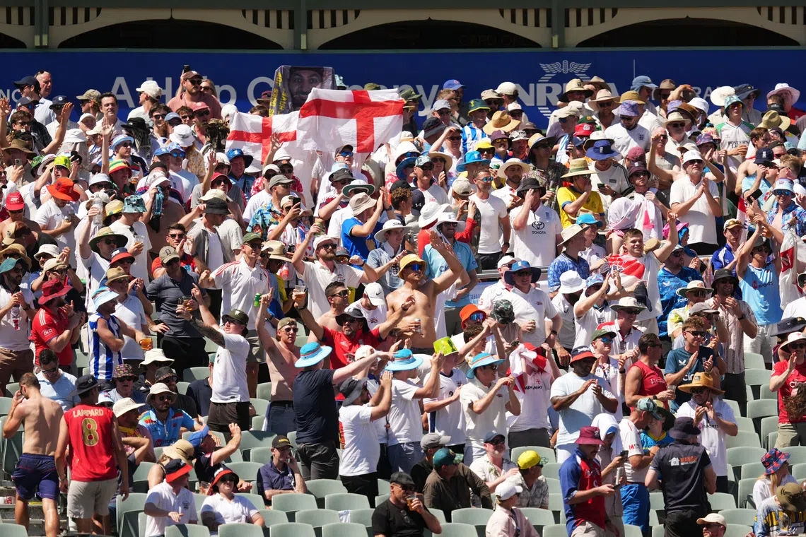 Cricket - The Ashes - Australia v England - Third Test - Adelaide Oval, Adelaide, Australia - December 18, 2025 Barmy Army fans cheer on the hill REUTERS/Asanka Brendon Ratnayake
