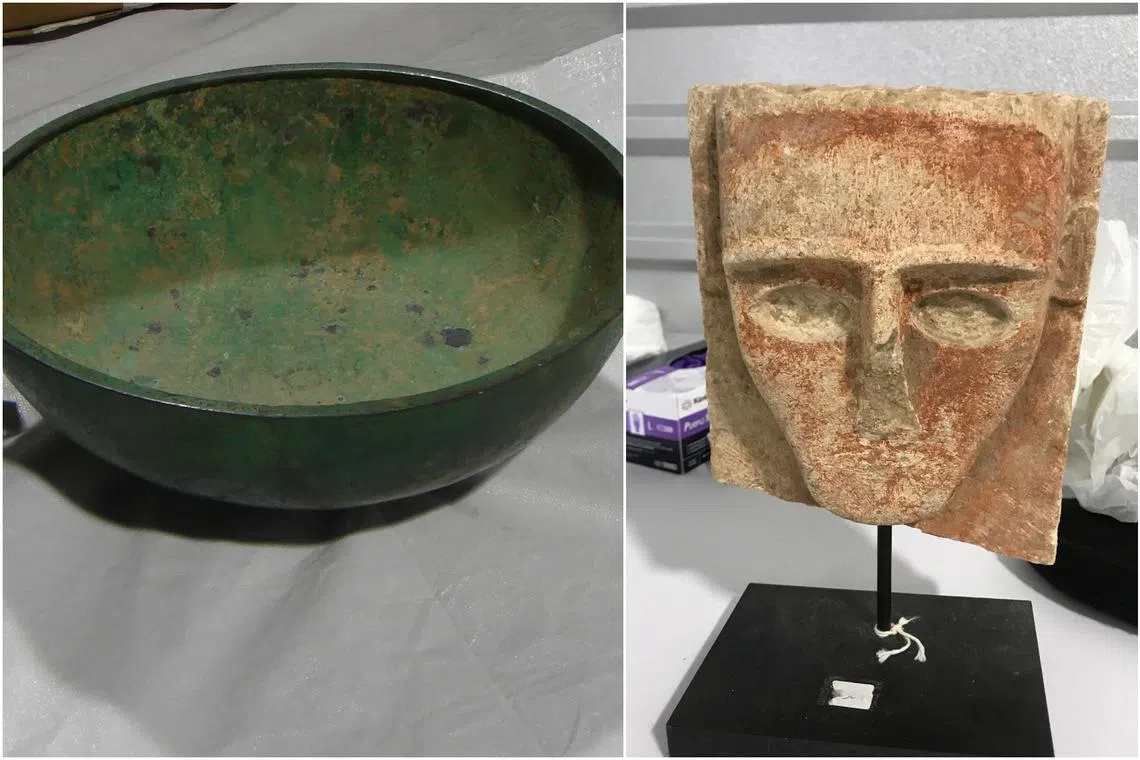 An inscribed bronze bowl and an ancient funerary stela were some of the 77 looted artifacts formally returned to Yemen by US officials on Feb 21. 