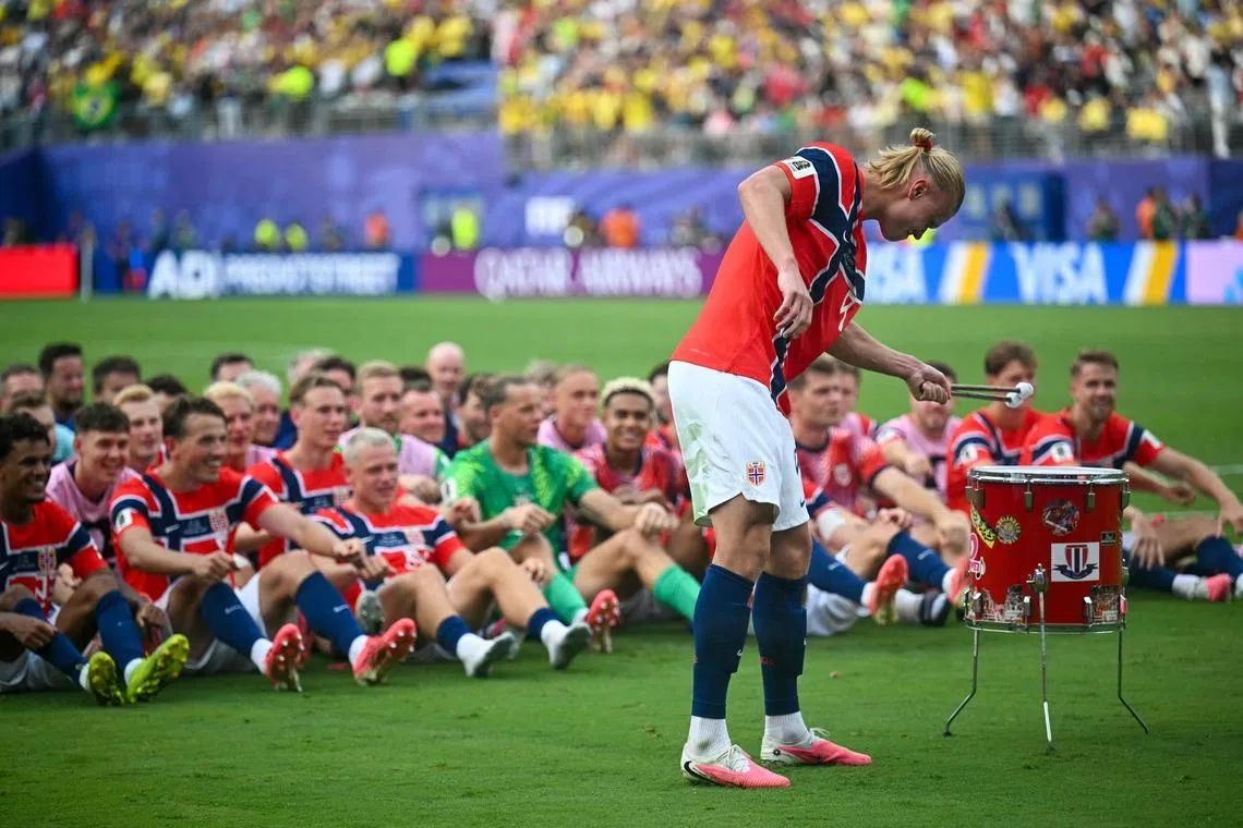 Erling Haaland and Norway celebrated their historic result with the iconic Viking row celebration.