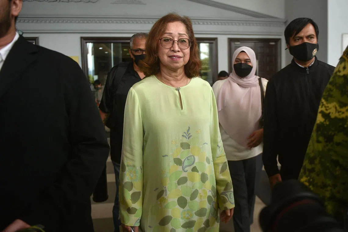 Na'imah Abdul Khalid (centre), wife of former Malaysian finance minister Daim Zainuddin, leaving the Kuala Lumpur High Court on Jan 23, 2024.