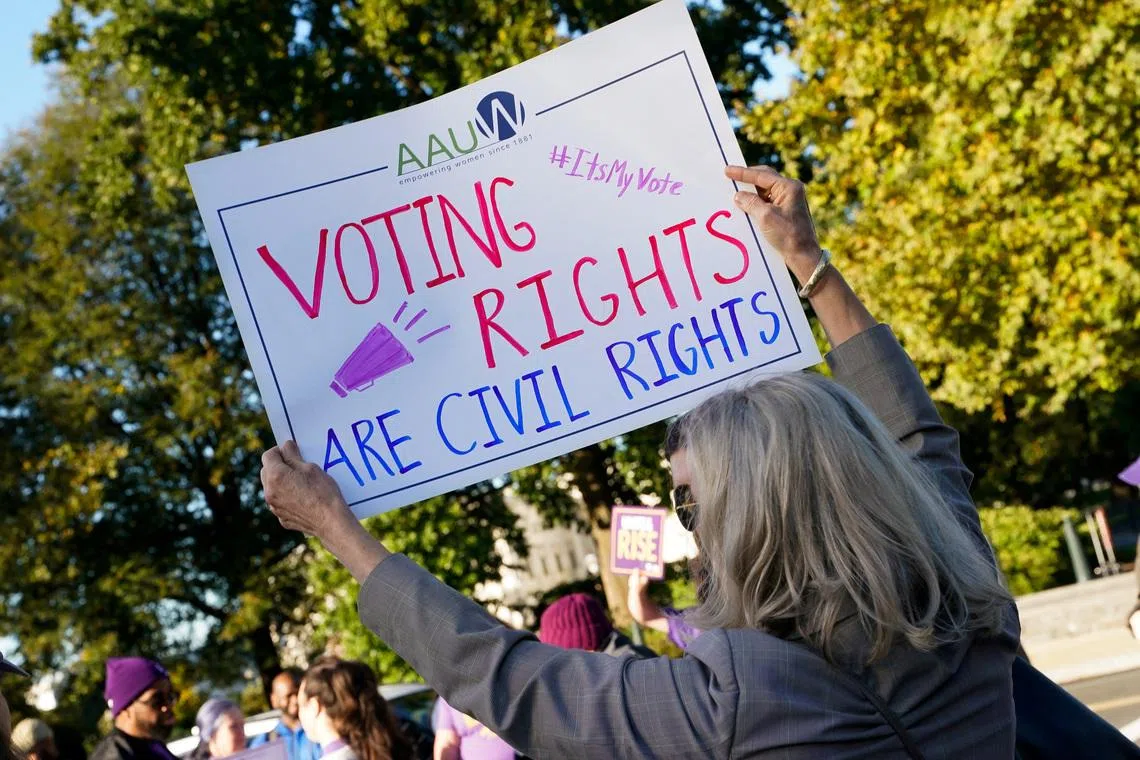 People protesting in Washington as the US Supreme Court heard arguments on the composition of Louisiana electoral districts, on Oct 15, 2025.