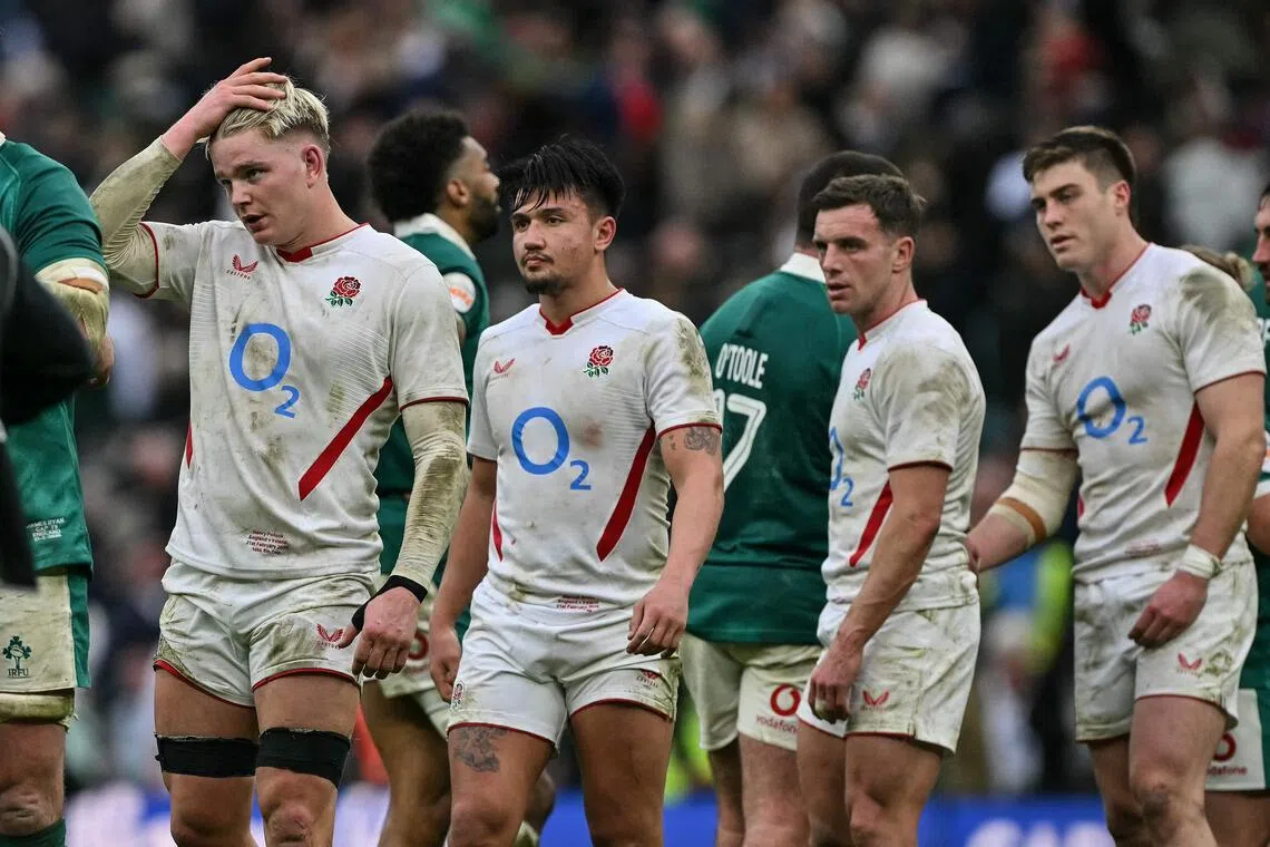 England players react at the end of their loss in the Six Nations match against Ireland at Allianz Stadium, Twickenham.