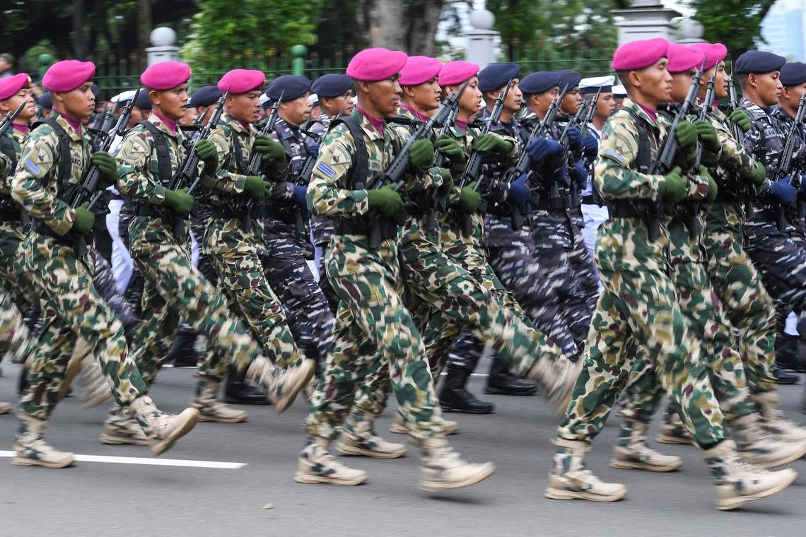 Soldiers take part in the ceremony to celebrate the 77th anniversary of the Indonesian Army near the palace in Jakarta, Indonesia, October 5, 2022. Antara Foto/Hafidz Mubarak A/via REUTERS/ File Photo