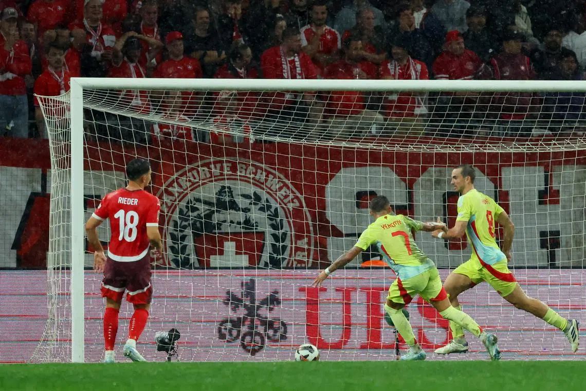 Soccer Football - Nations League - League A - Group 4 - Switzerland v Spain - Stade de Geneve, Geneva, Switzerland - September 8, 2024 Spain's Fabian Ruiz celebrates scoring their third goal with Yeremy Pino REUTERS/Denis Balibouse