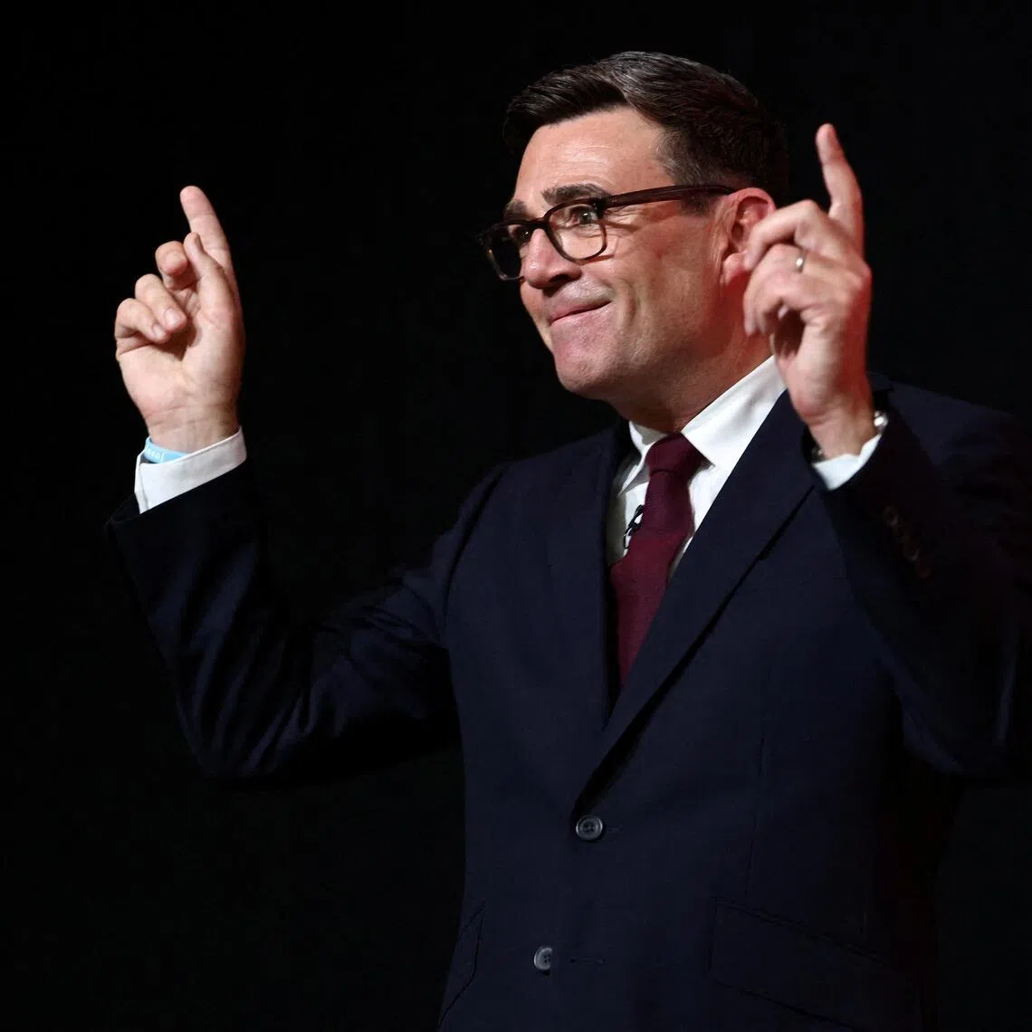 Andy Burnham gestures after being confirmed as the Labour Party’s new leader and the country’s next Prime Minister on July 17.