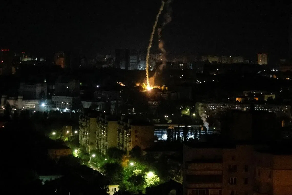 An explosion of a missile is seen in the city during a Russian missile strike, amid Russia's attack on Ukraine, in Kyiv, Ukraine May 16, 2023. REUTERS/Gleb Garanich
