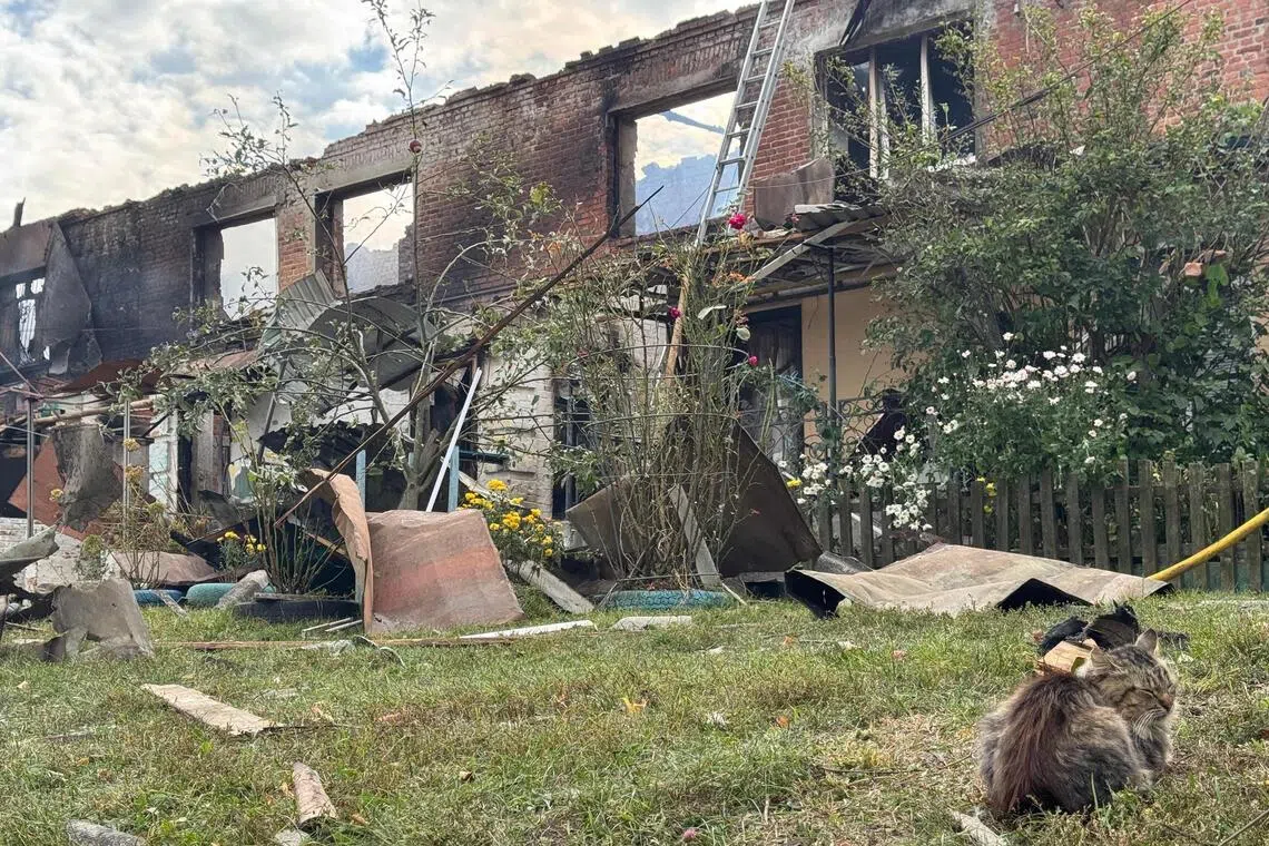 A damaged residential building following a Russian drone attack in Ukraine's Sumy region.