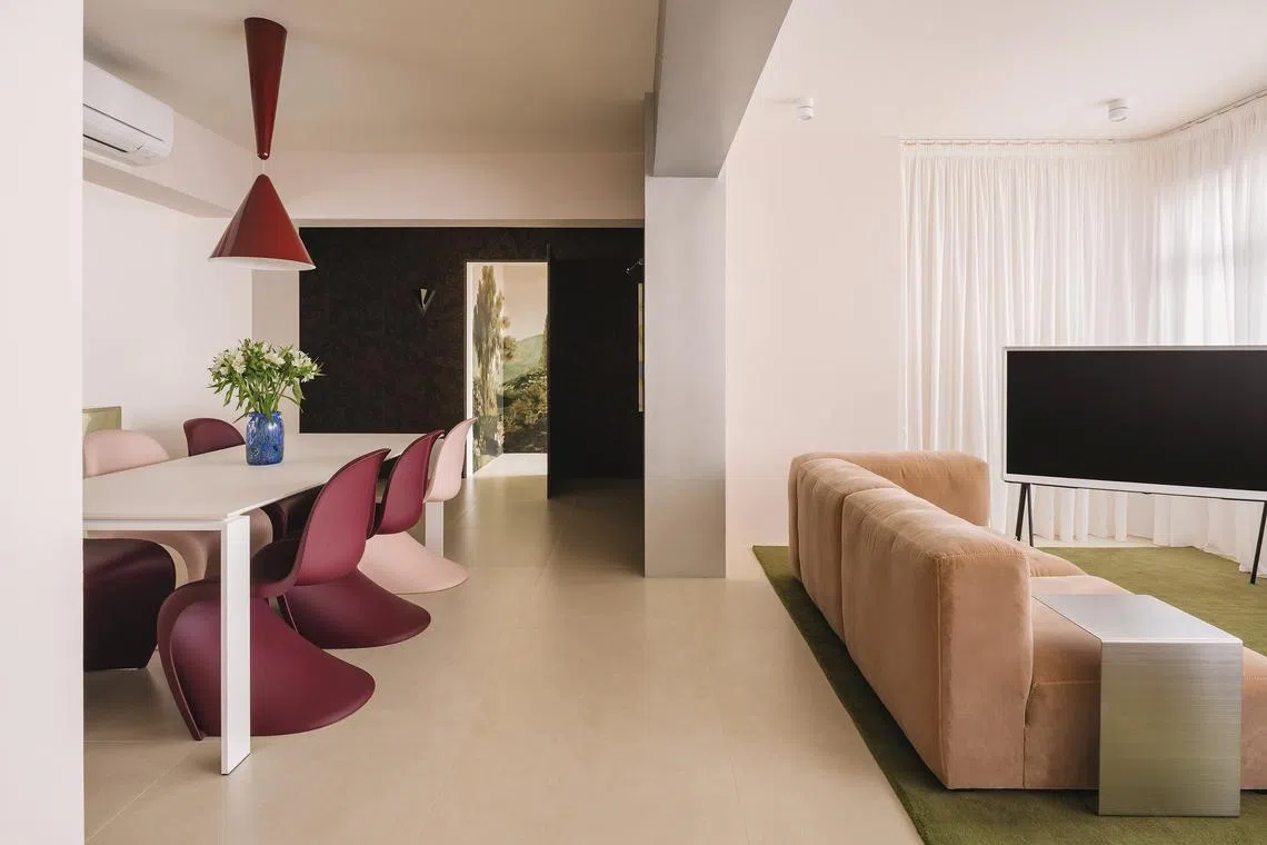 This BTO flat in north-east Singapore channels the spirit of the 1980s with modern-retro furniture and warm colours.